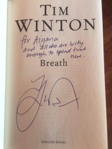 The inside cover page of Tim Winton's book Breath with his signature.